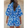 imagePRETTYGARDEN Womens Rompers for Summer 2025 Beach Vacation Clothes Short Sleeves Floral Jumpsuits Beach Cover UpBlue