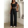imagePRETTYGARDEN Womens 2 Piece Matching Lounge Sets Ribbed Short Sleeve Crop Tops Wide Leg Pants 2026 Summer Airport OutfitsBlack