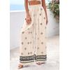 imagePRETTYGARDEN Womens Wide Leg Palazzo Pants 2026 Summer Boho Floral Trousers Spring Flowy Beach Vacation Clothes Resort WearApricot Black