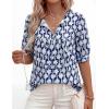 imagePRETTYGARDEN Womens Summer Boho Tops 2026 Vacation Outfits Casual Tie Front V Neck Peasant Blouses Puff Short Sleeve ShirtsFloral Navy