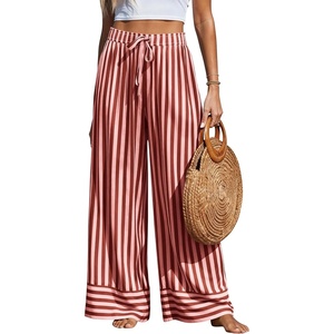 image:imagePRETTYGARDEN Womens Palazzo Pants 2026 Summer Striped Satin Wide Leg High Waisted Flowy Lounge Trousers PocketsStriped Brick Red